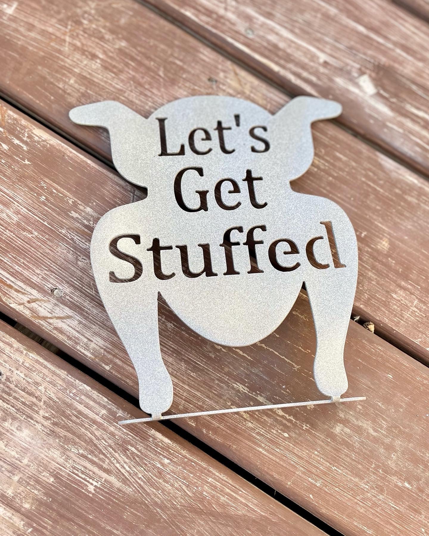 Let’s get stuffed sign